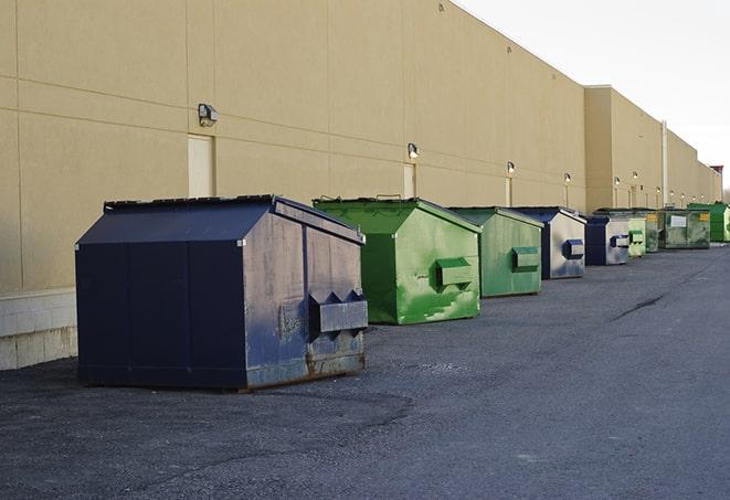 a construction dumpster filled with debris in Alameda